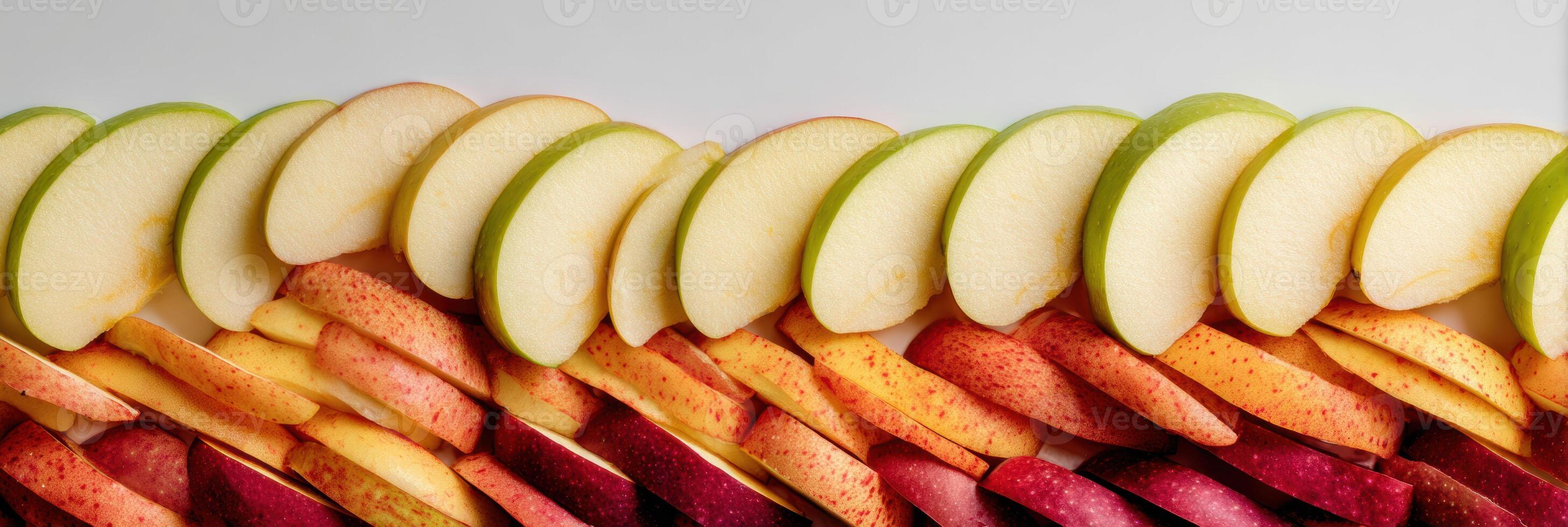 Sliced Apples Arranged Vertically With a Smooth Gradient Fading Into a Neutral Background and an Open Upper Space for Design Flexibility photo