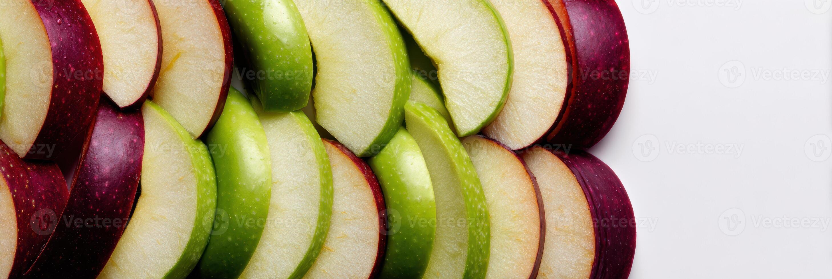 Sliced Apples Arranged in a Vertical Layout Blending Into a Light Background With a Blank Upper Zone Showcasing Freshness and Simplicity photo