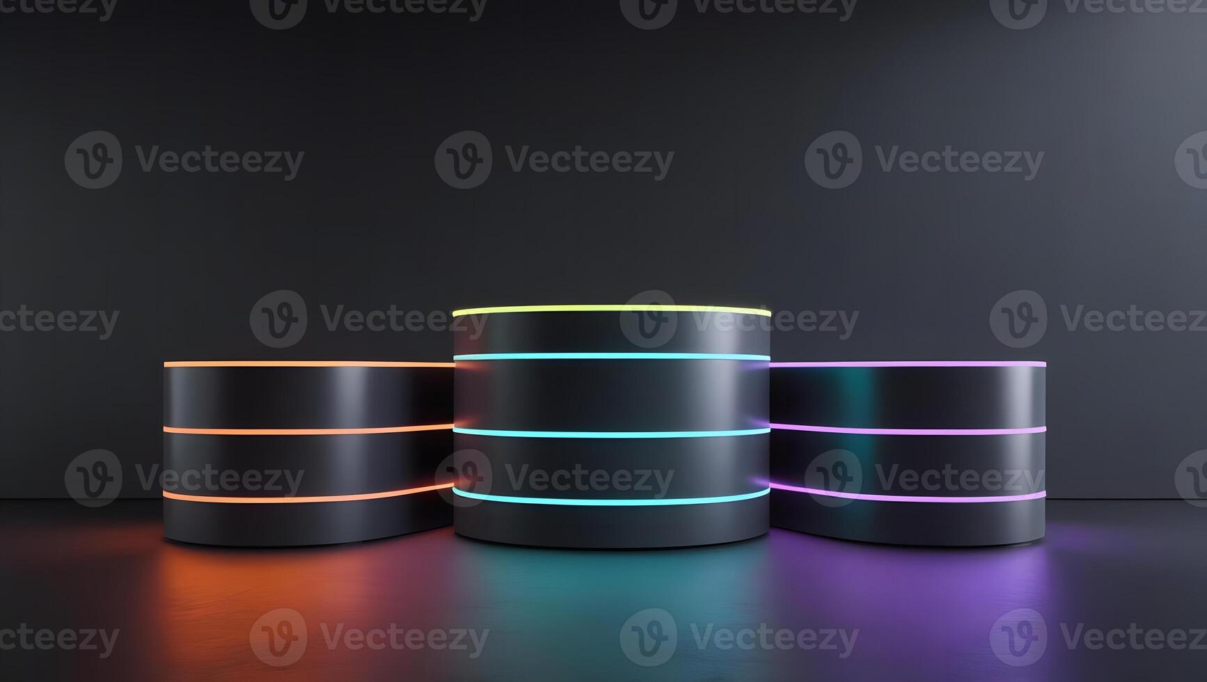 Three dark cylindrical pedestals with colorful neon light accents on a dark background photo