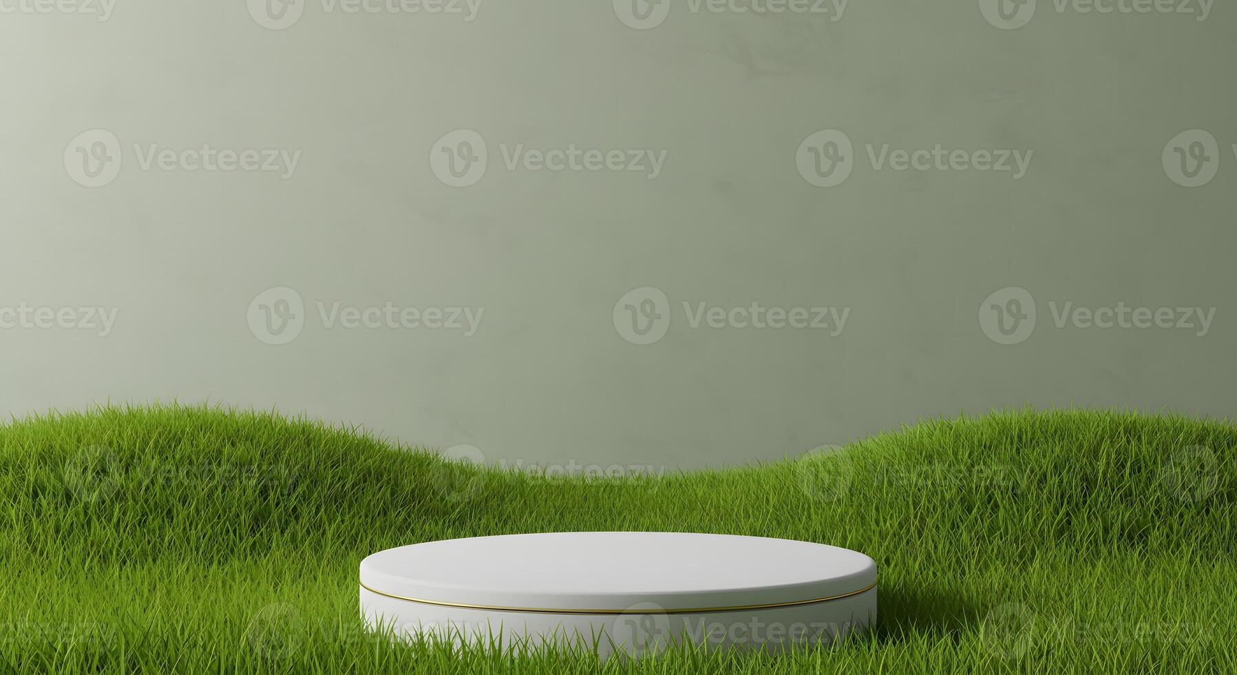 Minimalist white podium with gold trim on lush green grass against a muted green background photo
