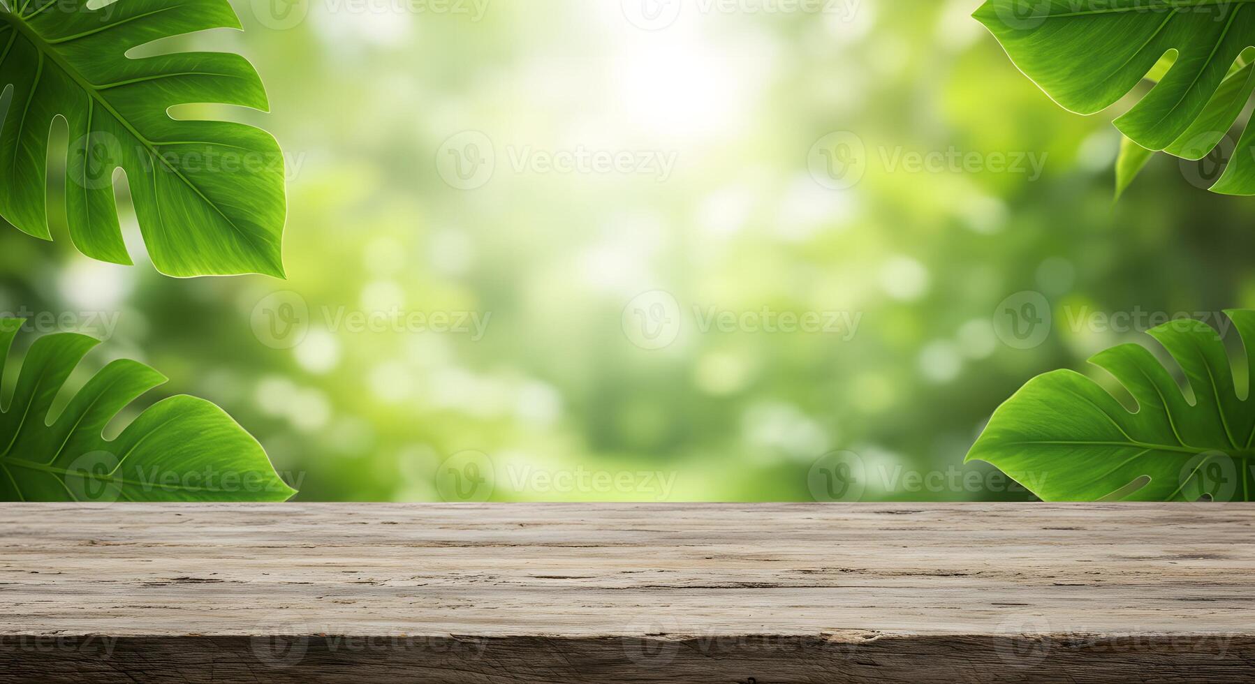 Rustic wooden table with lush green monstera leaves and soft bokeh background photo
