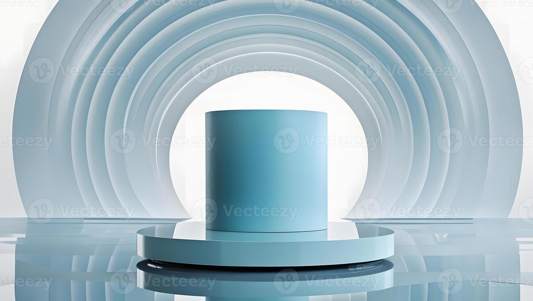 Minimalist stage with a blue cylinder on a reflective surface and a curved backdrop photo