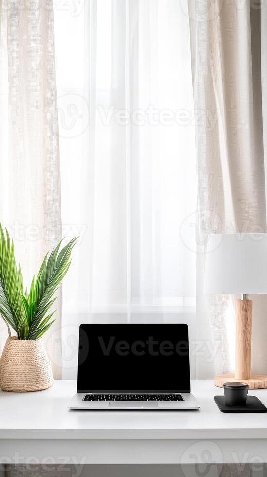 Sleek Home Office Interior A Modern Workspace Featuring a Laptop, Lush Greenery, and Soft Natural Light for Focused Productivity photo