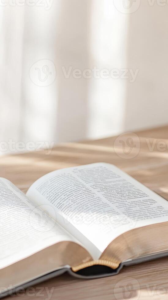 Serene Open Book on Wooden Table Bathed in Natural Light, Symbolizing Spiritual Study, Wisdom, and Peaceful Contemplation photo