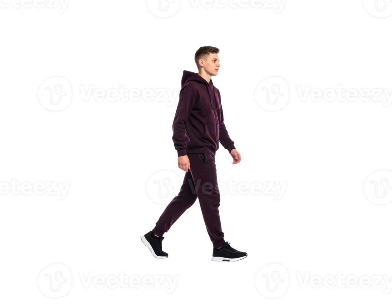 Fulllength side view of a young man walking in a stylish maroon hoodie and matching tracksuit pants. png