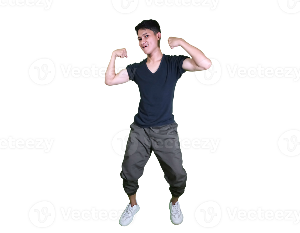 young man dressed casually poses happily sitting while showing off his arm muscles. png