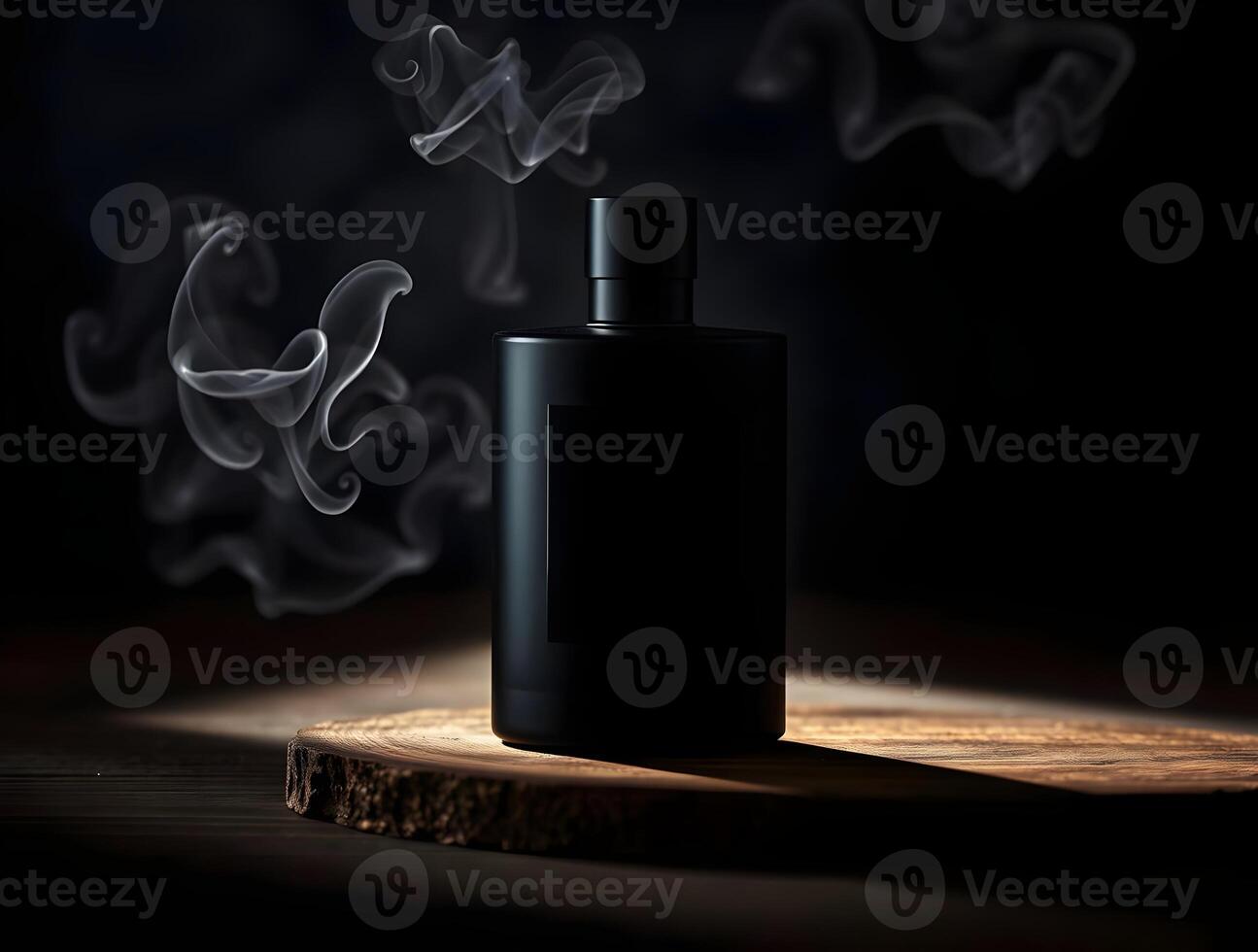 A black bottle of perfume on a wooden table photo