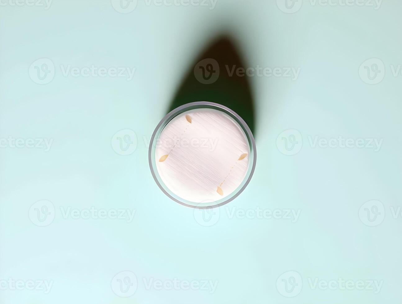 A white object in the middle of a blue background photo