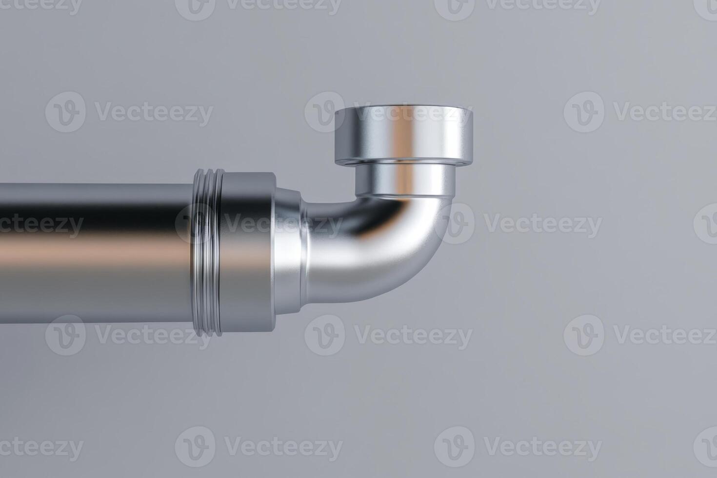 Close-up view of a shiny metal pipe elbow in industrial setting showcasing its reflective surface and smooth curves photo