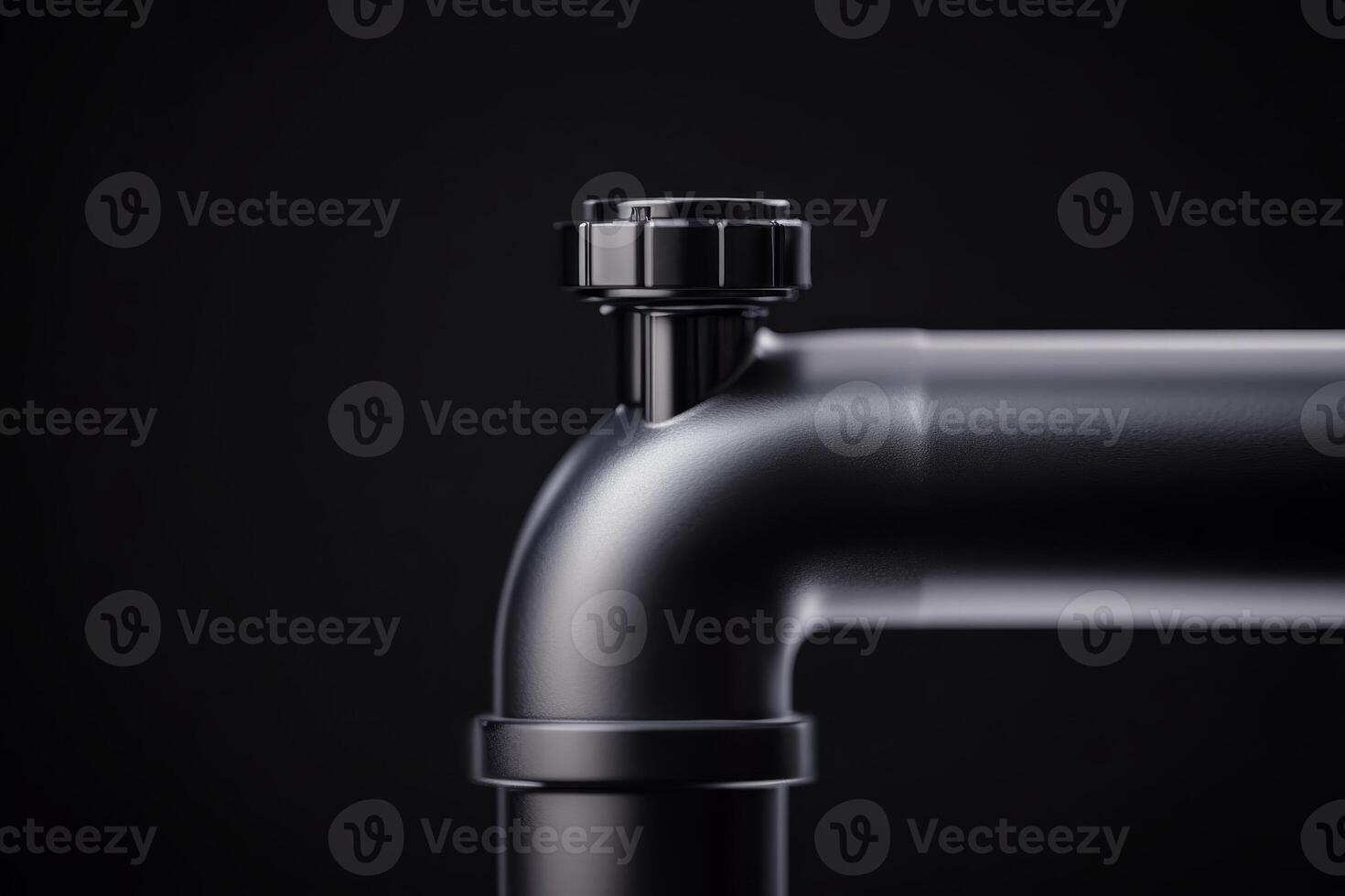 Modern black plumbing pipe fitting on a dark background highlighting industrial design and craftsmanship photo