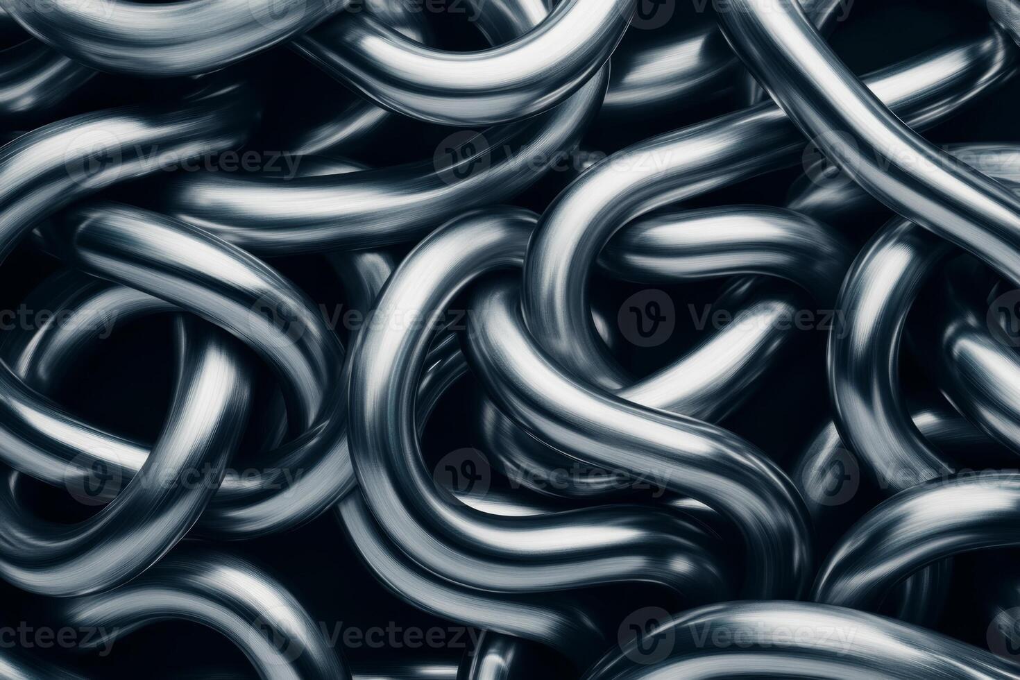 Metallic chains intertwined against a dark background showcasing texture and shine photo