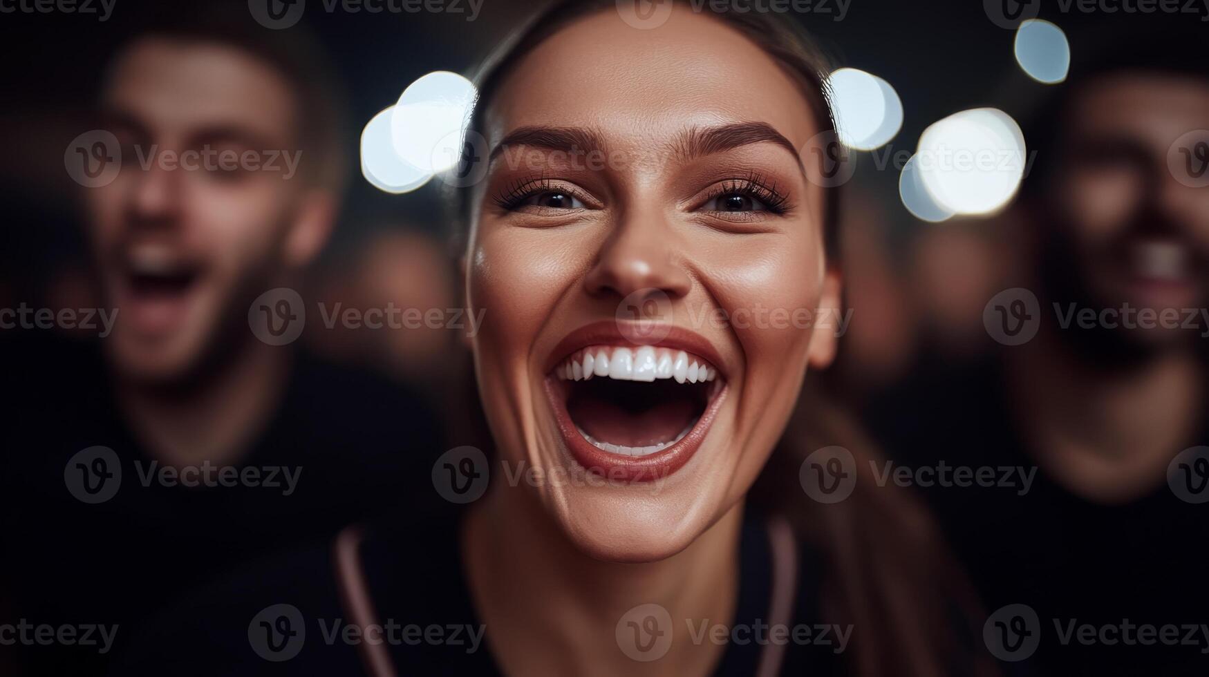 Joyful woman celebrating with friends in a lively atmosphere at night event photo