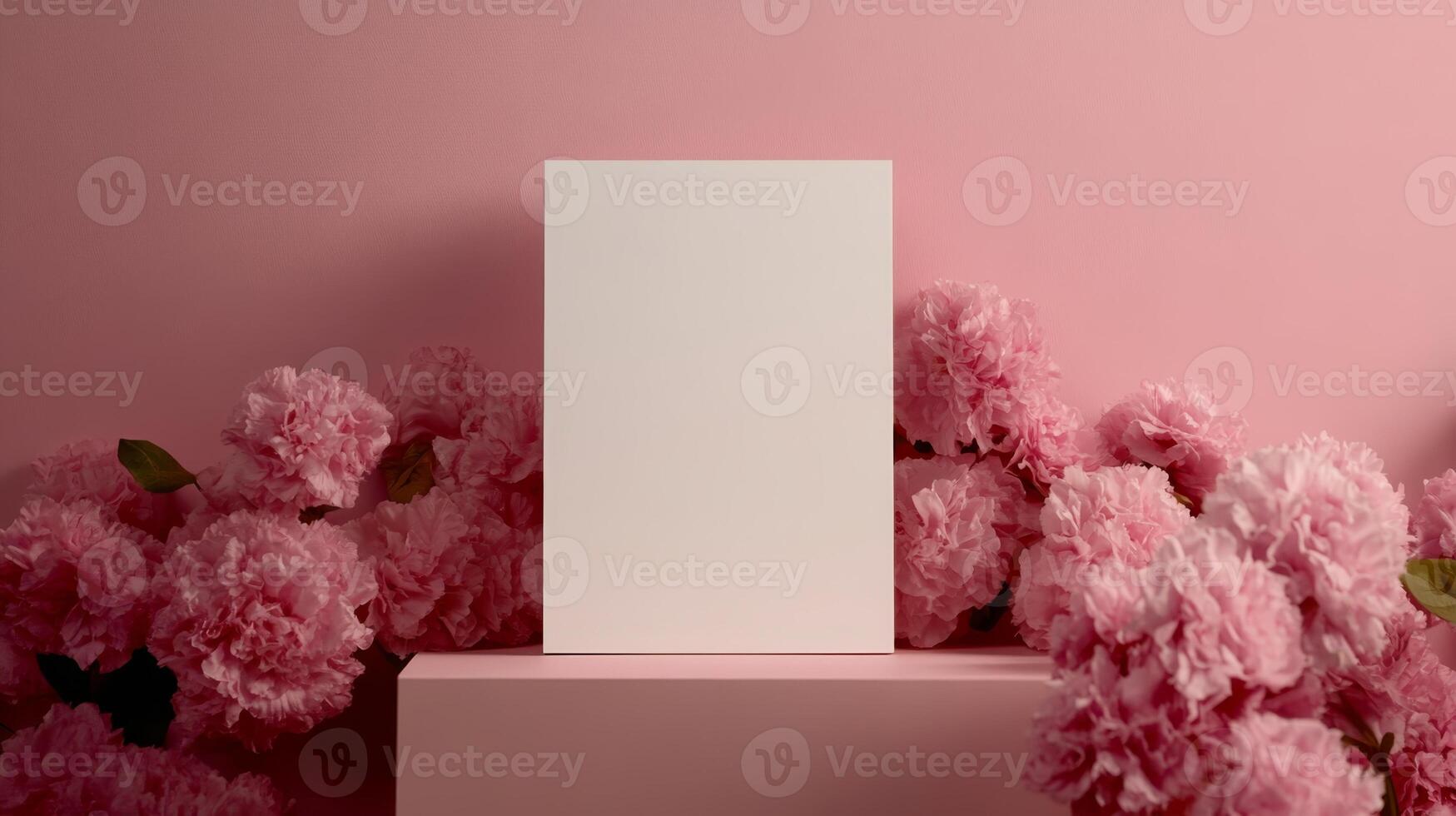 Blank canvas surrounded by pink flowers on a light background ideal for creative designs and stationery mockups photo