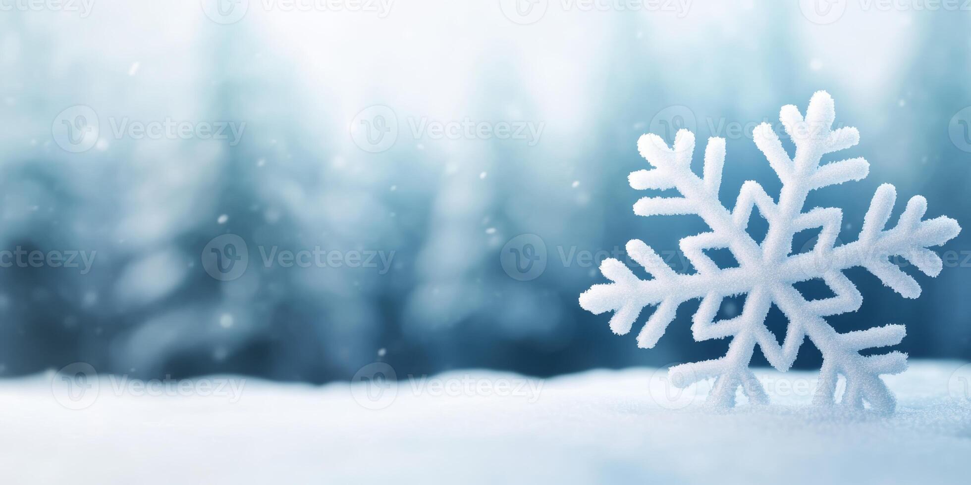 Delicate snowflake rests on soft snow against a blurred winter forest background, capturing the essence of a serene cold day photo