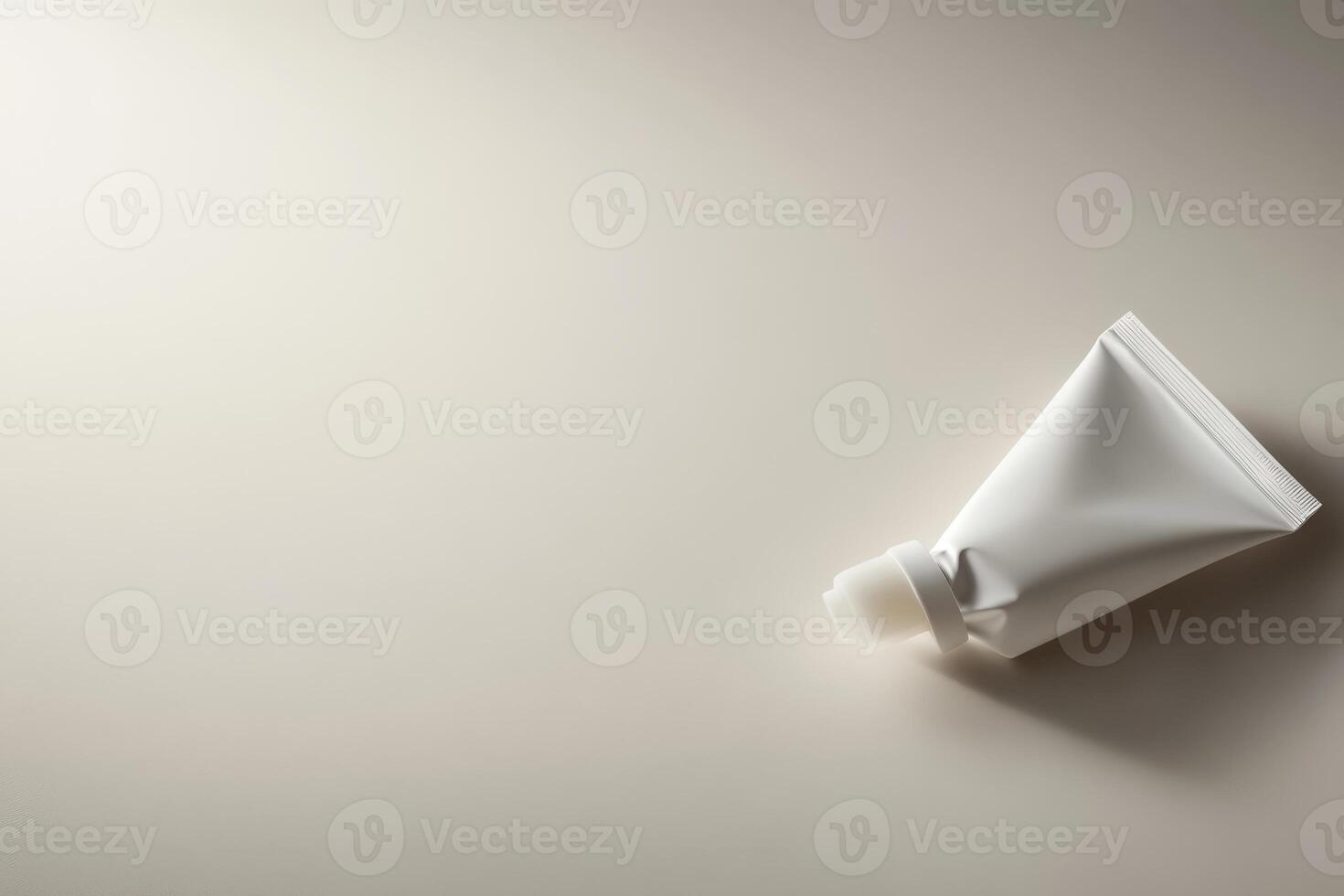 White tube with cap placed on a neutral background showcasing minimalist design and texture ideal for branding and product display photo