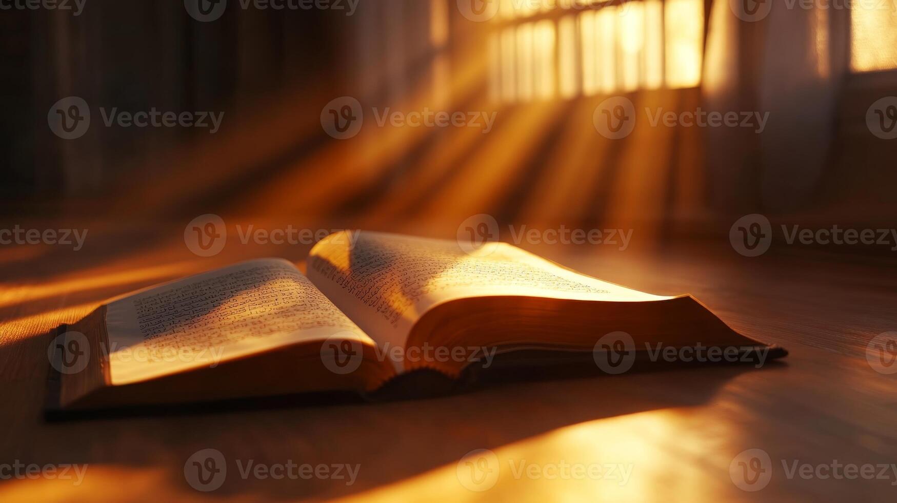 Sunlight streaming through window illuminates open book on wooden surface during early morning hours photo
