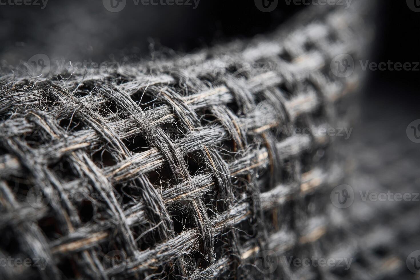 Close up view of matte dyed Kevlar fabric showcasing intricate weaving and texture details photo