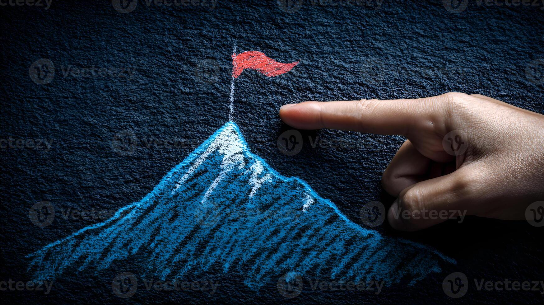 Manager pointing to the top of a mountain with flag representing success photo