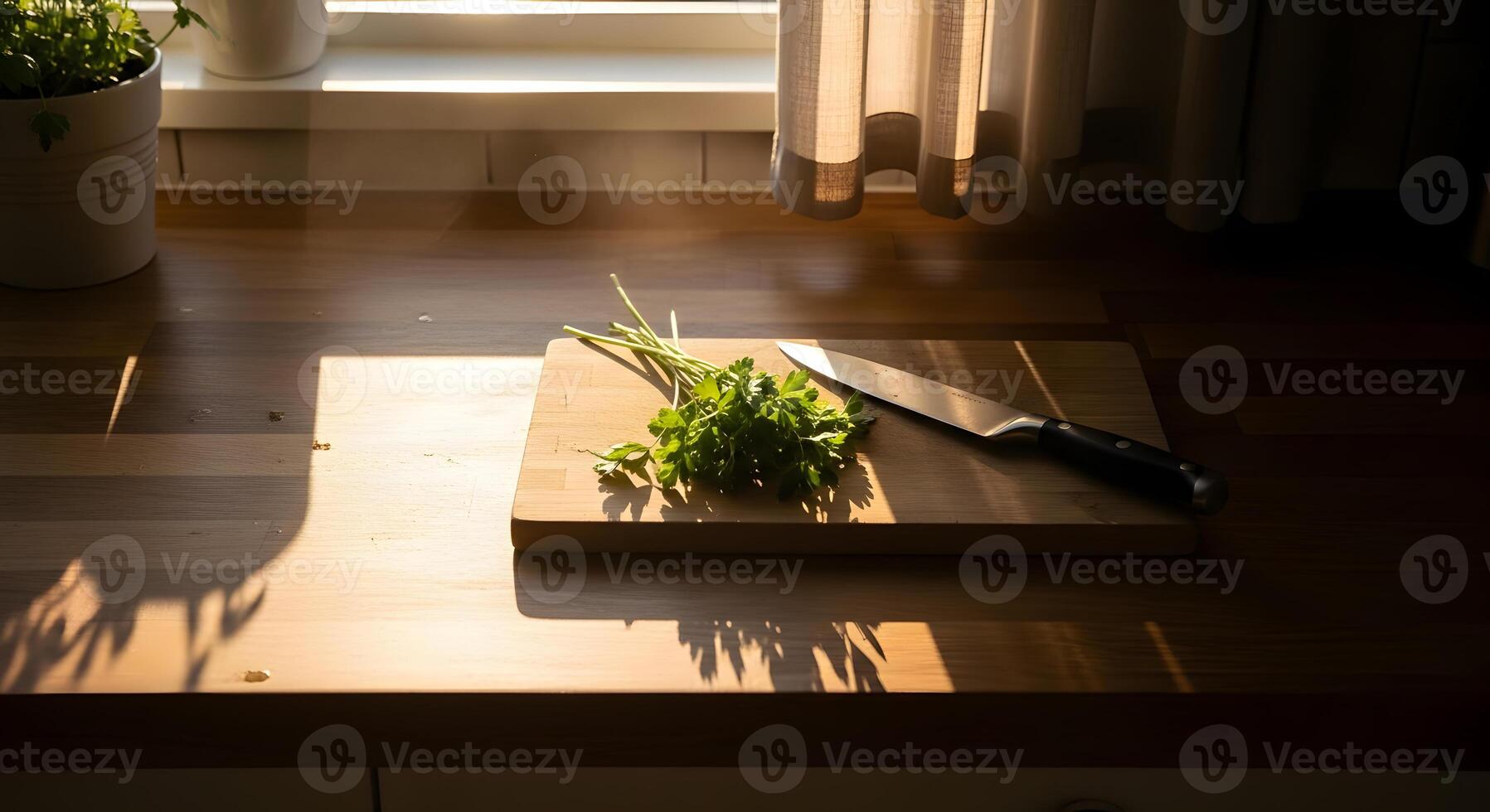 A knife and a cutting board on a counter photo