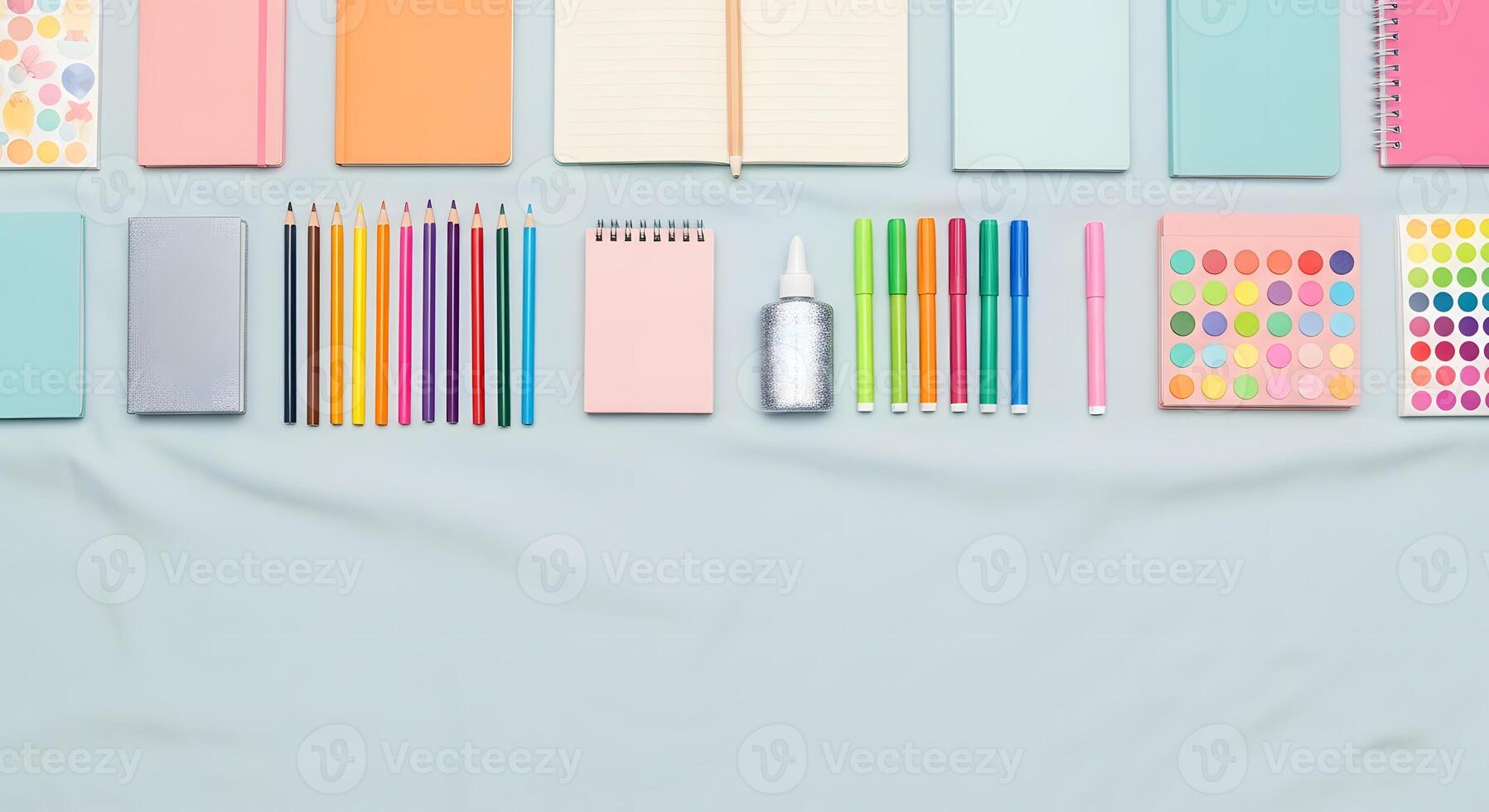 Colorful stationery on a blue background photo