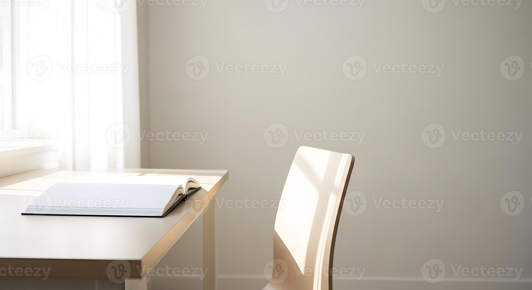 A chair and a desk in front of a window photo