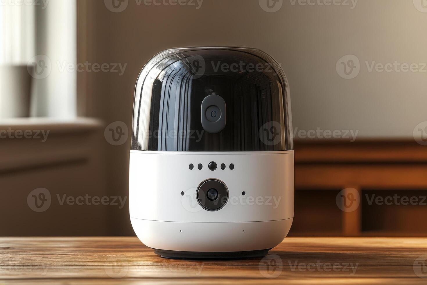 A smart home camera sitting on a table photo