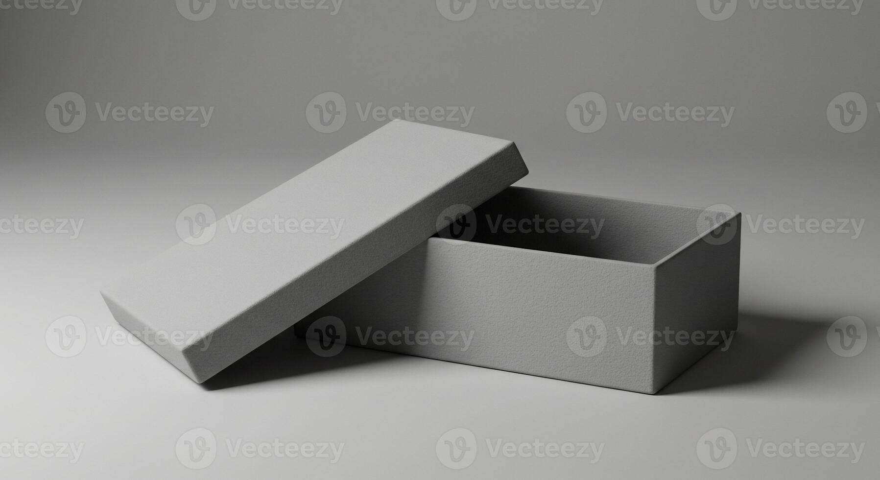 Open gray box with lid at an angle, minimalist presentation photo