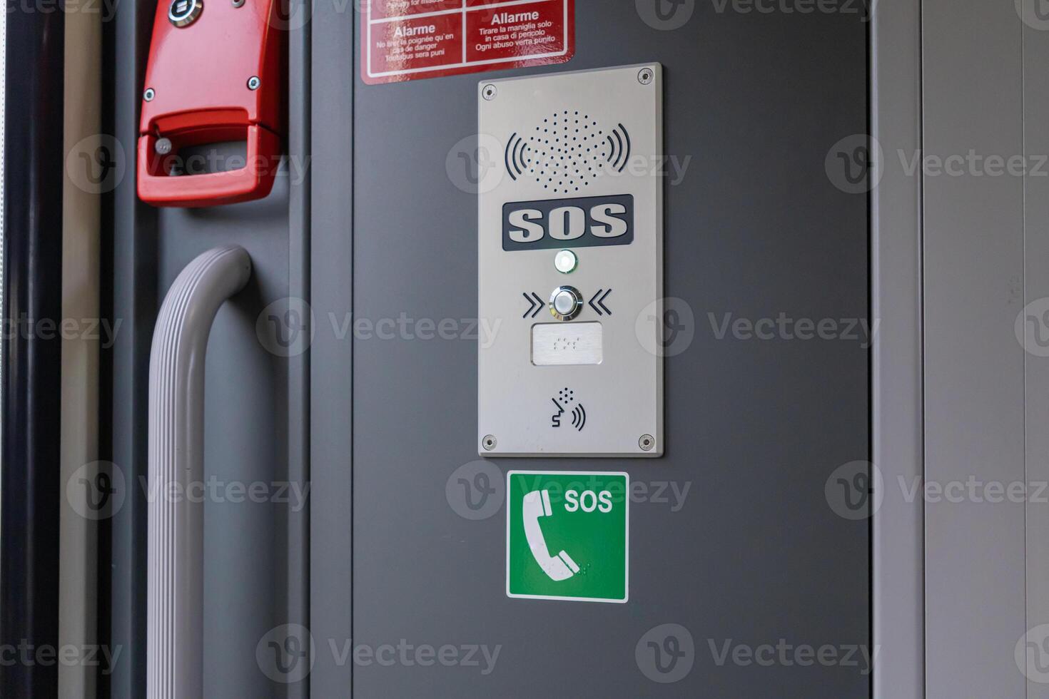 Emergency call point with illuminated SOS button and intercom system, providing vital passenger assistance and immediate communication for safety in transit photo