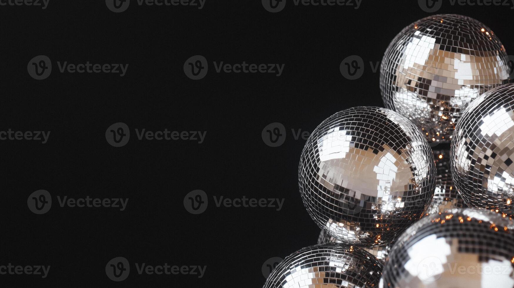 reflective silver disco balls arranged as a seamless party background photo