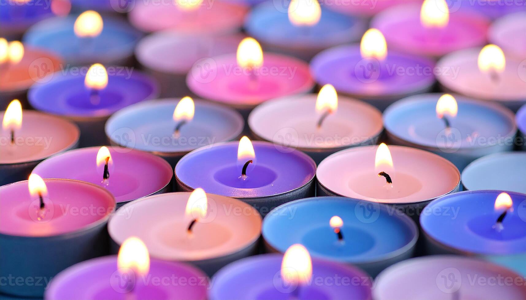 Vibrant Sea of Light Glowing Pink, Purple, and Blue Tealight Candles photo