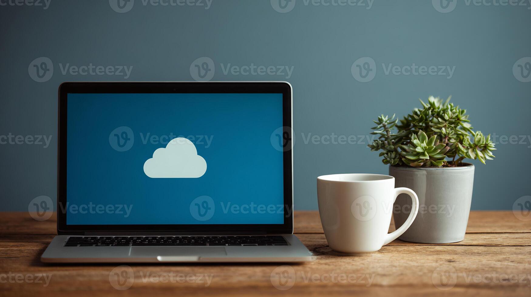 Laptop with cloud icon on screen, representing cloud storage and modern technology. photo