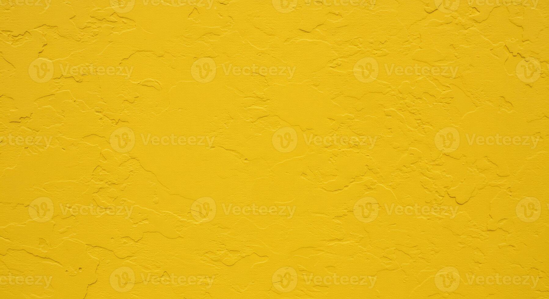 Bright yellow textured wall background, stucco plaster surface. Ideal for design projects. photo