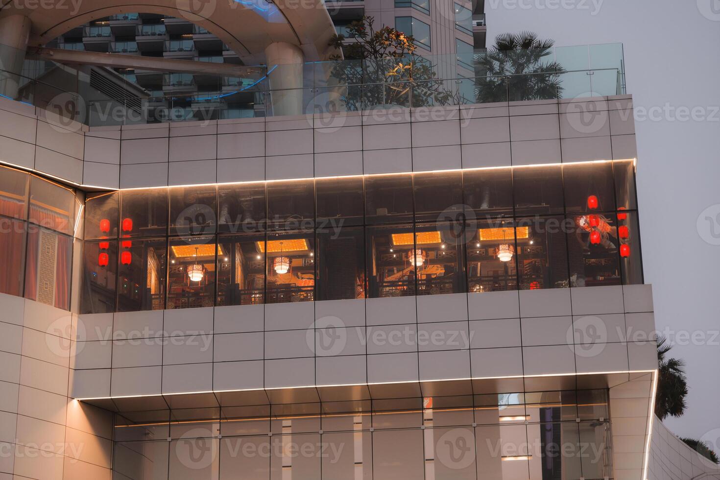 This is a modern architectural design showcasing a unique glass facade that captivates attention photo