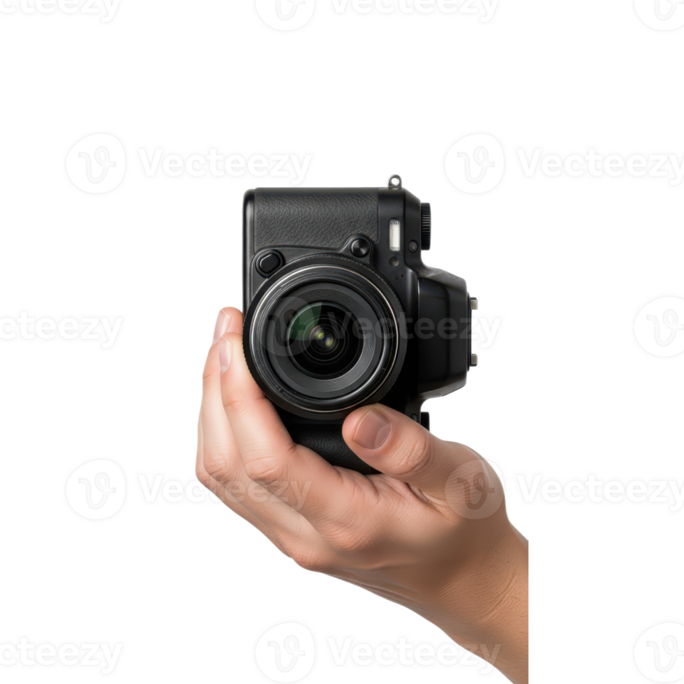 A persons hand is holding a black digital camera with a lens in a studio setting png