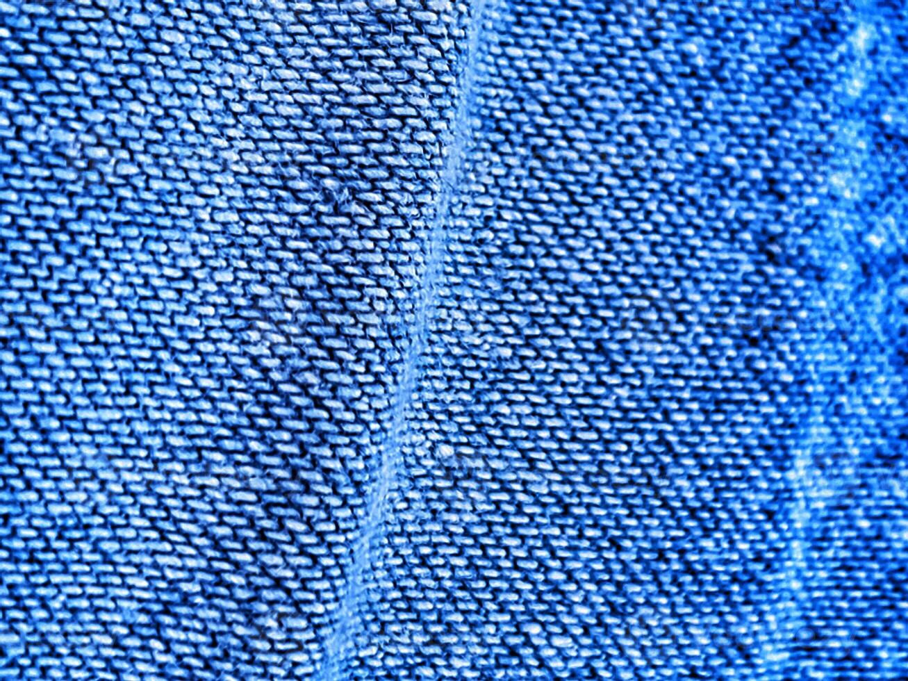 Blue Denim Texture Close-up with Seam Detail photo