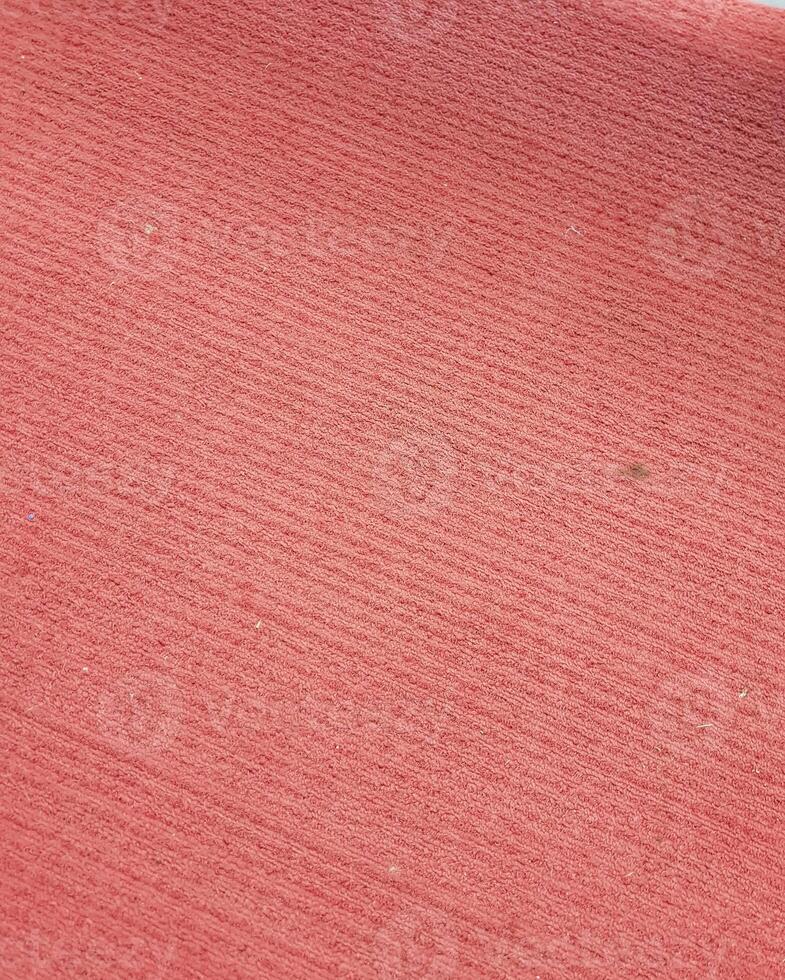 Texture of Reddish Textile Fabric Close-up for Background photo