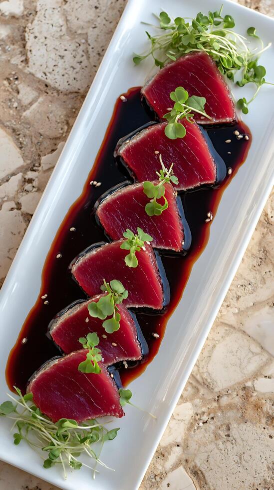 Delicious Seared Tuna Slices with Soy Sauce and Sprouts. photo