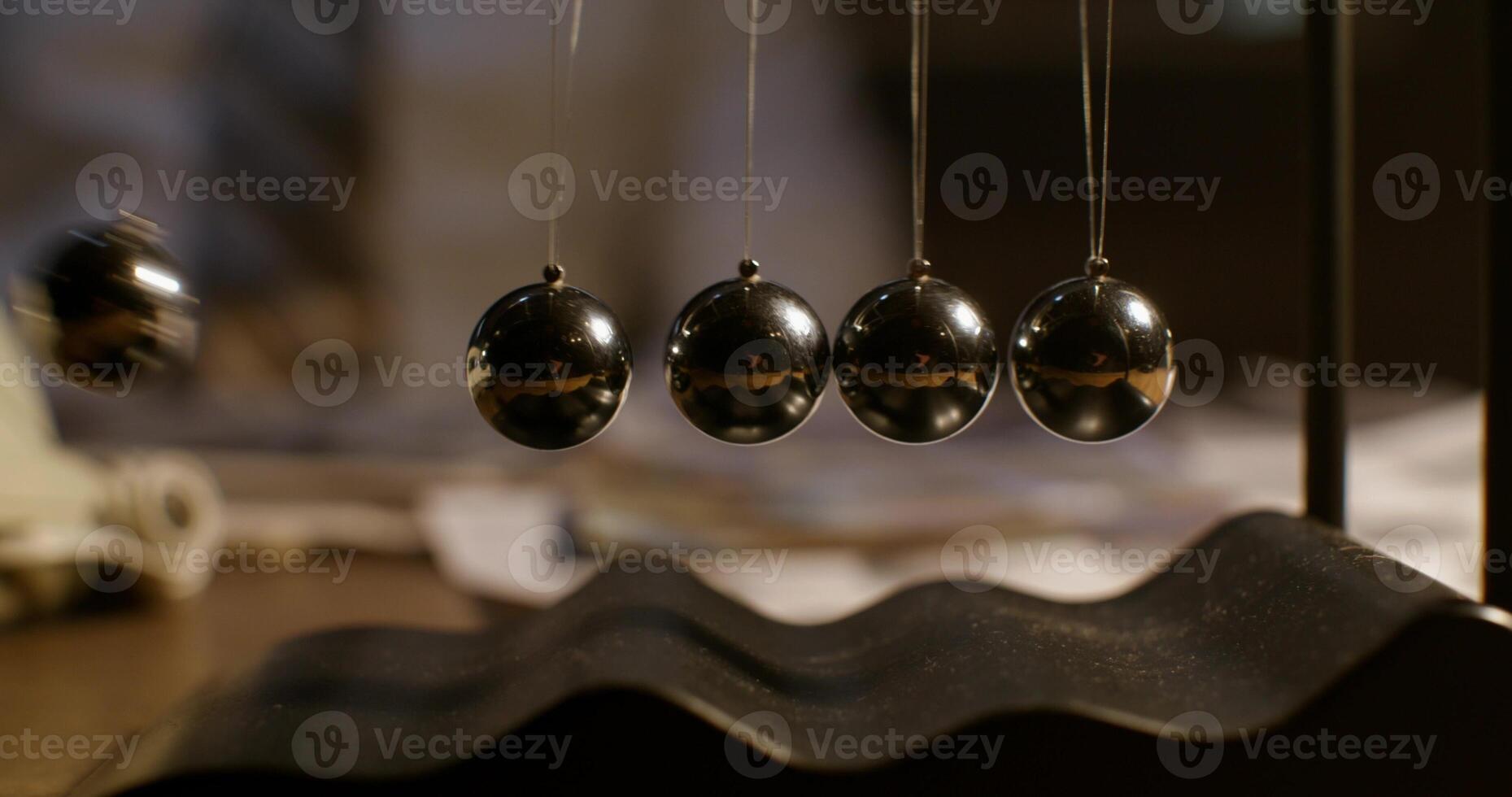 A bunch of black balls on a table photo