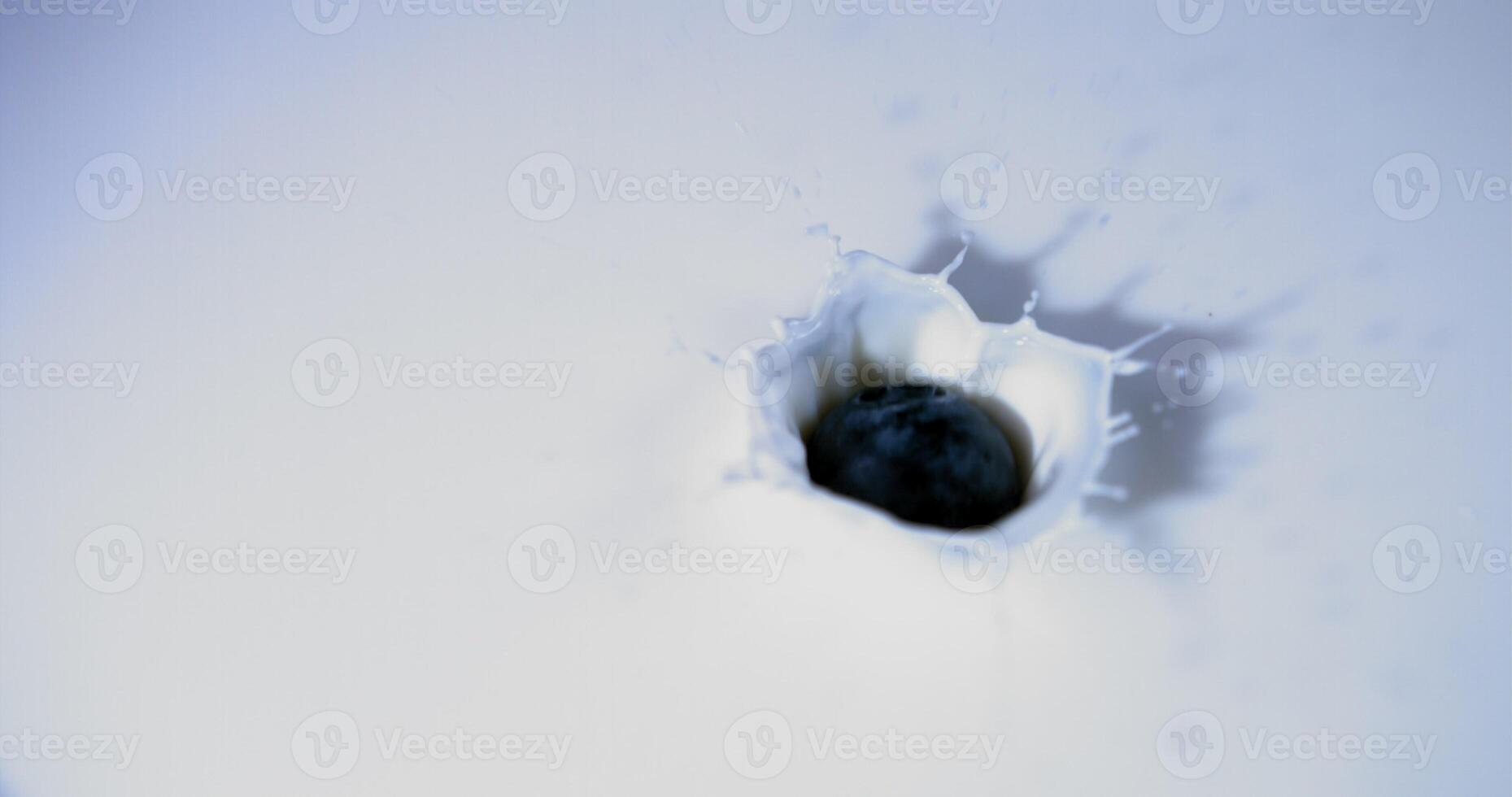 A hole in the wall with a blue ball inside photo