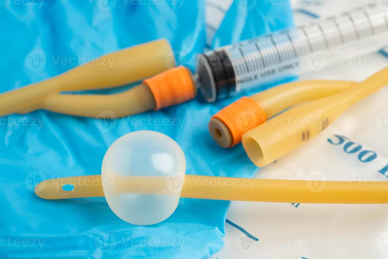 Foley urinary catheter with urine bag for disability or patient i photo
