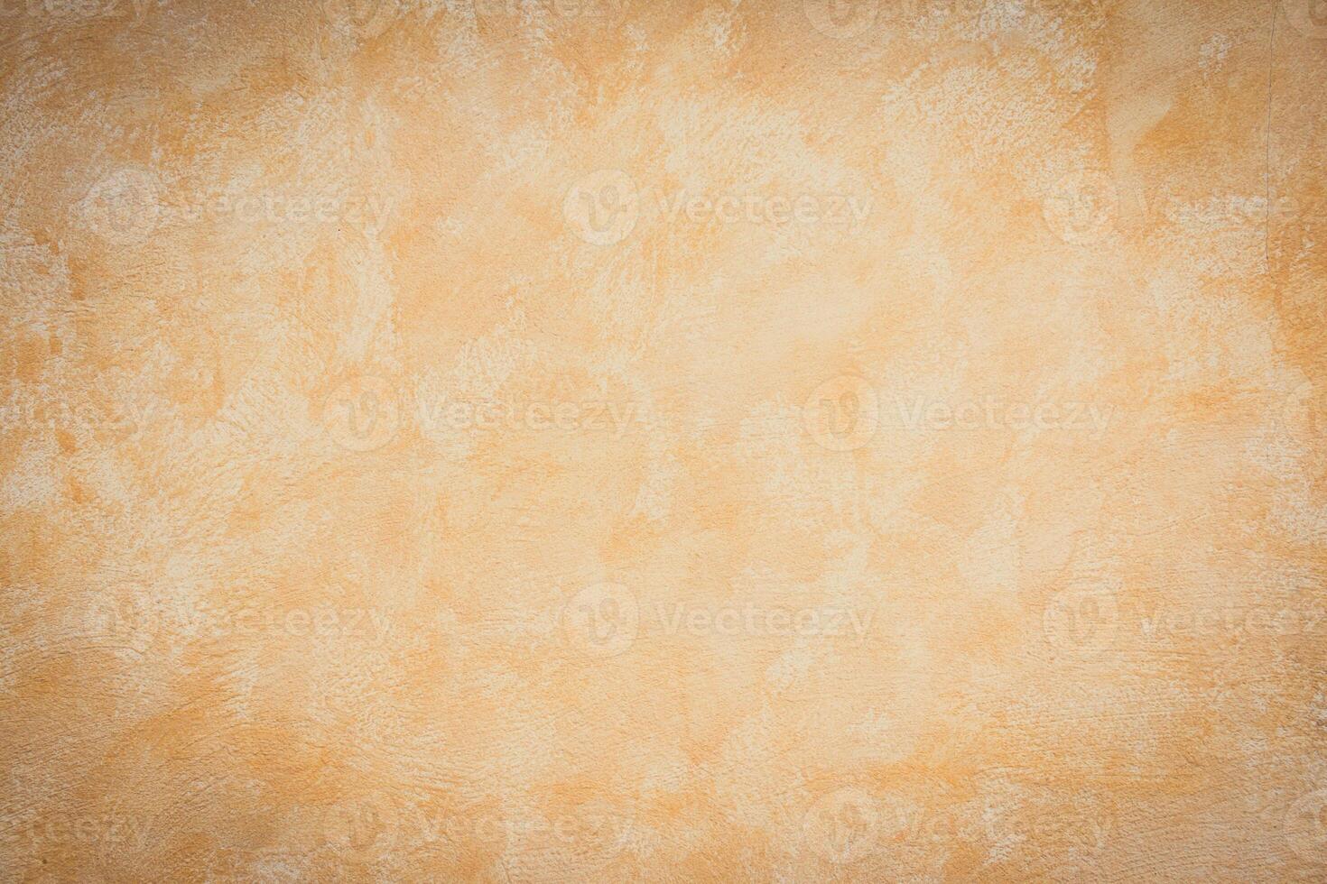 A brown and tan wall with a white paint photo