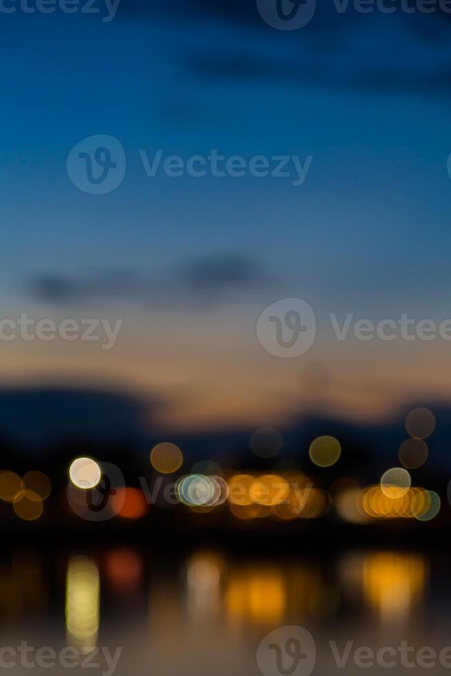 A blurry photo of a city at dusk