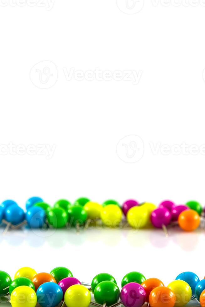 A row of colorful candy canes on a white background photo