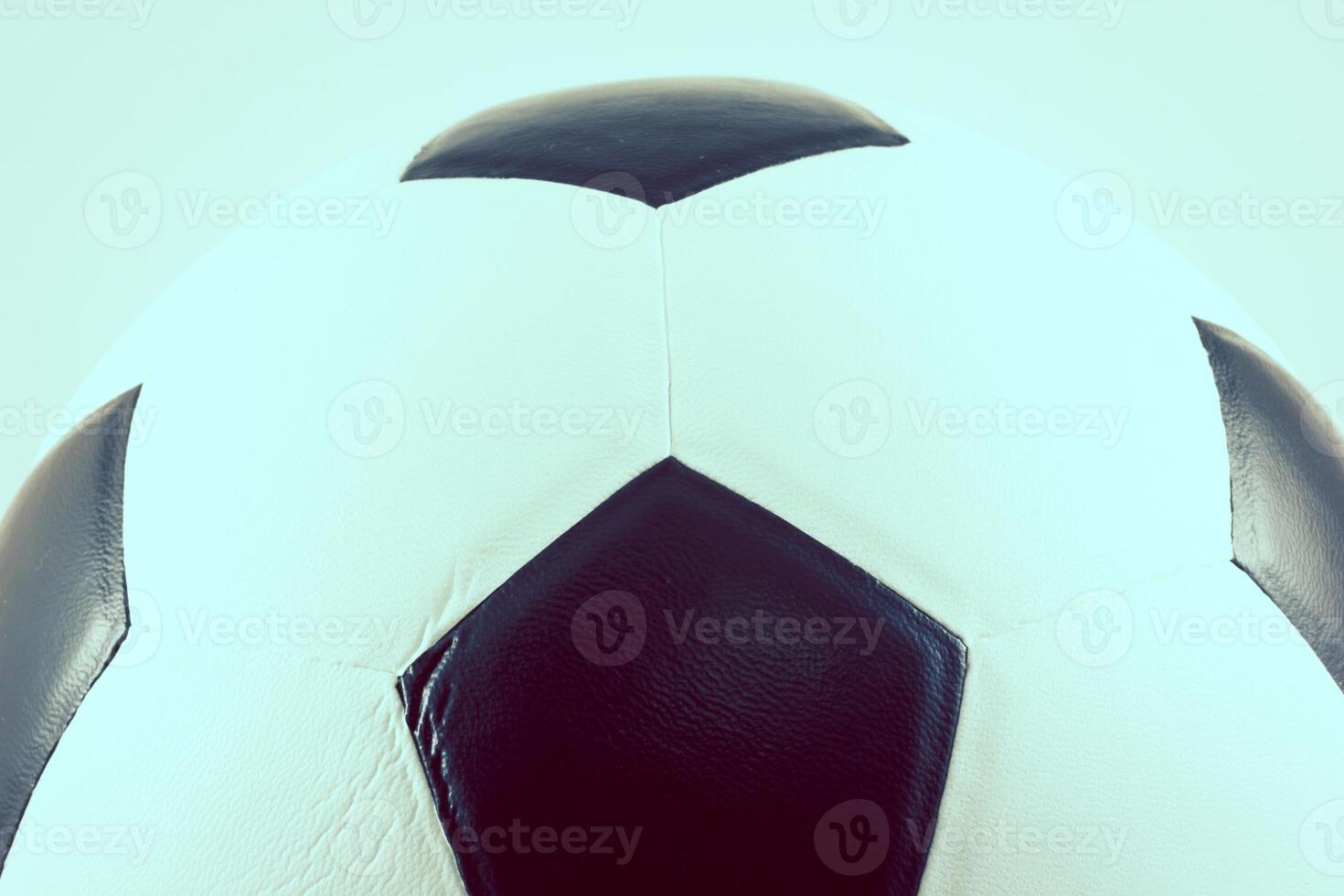 A close up of a soccer ball on a white background photo