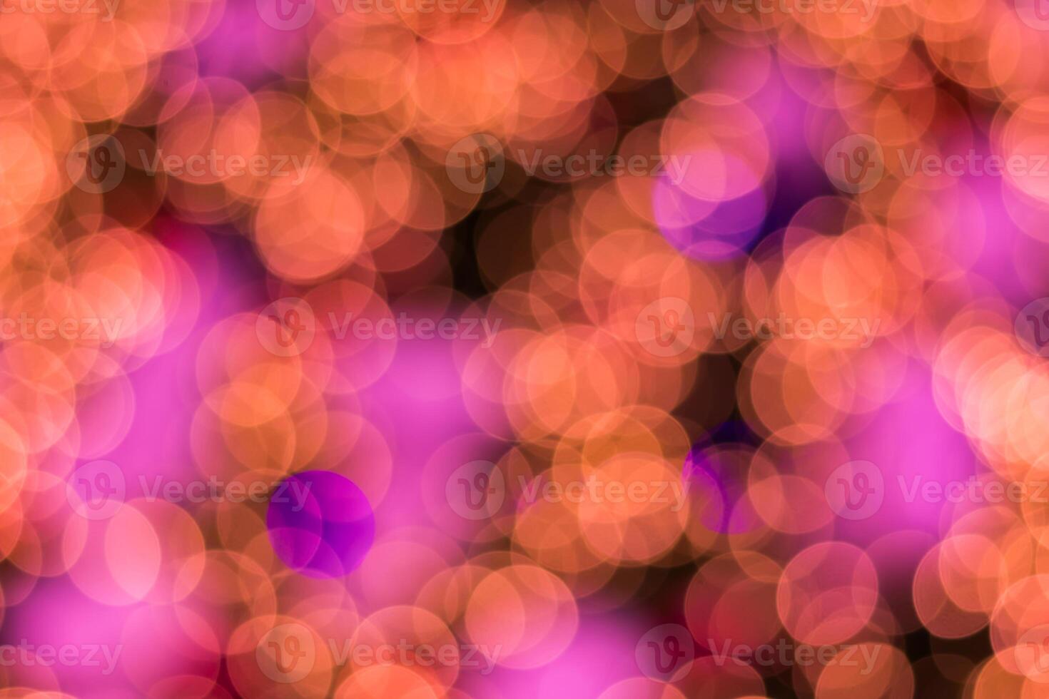 A blurry image of a purple and pink background photo