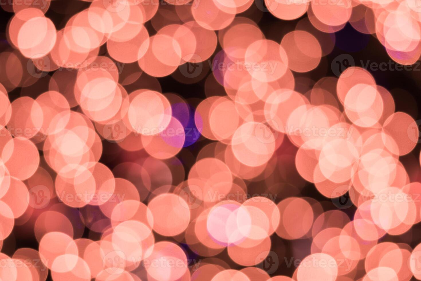 A blurry image of a pink and purple light photo