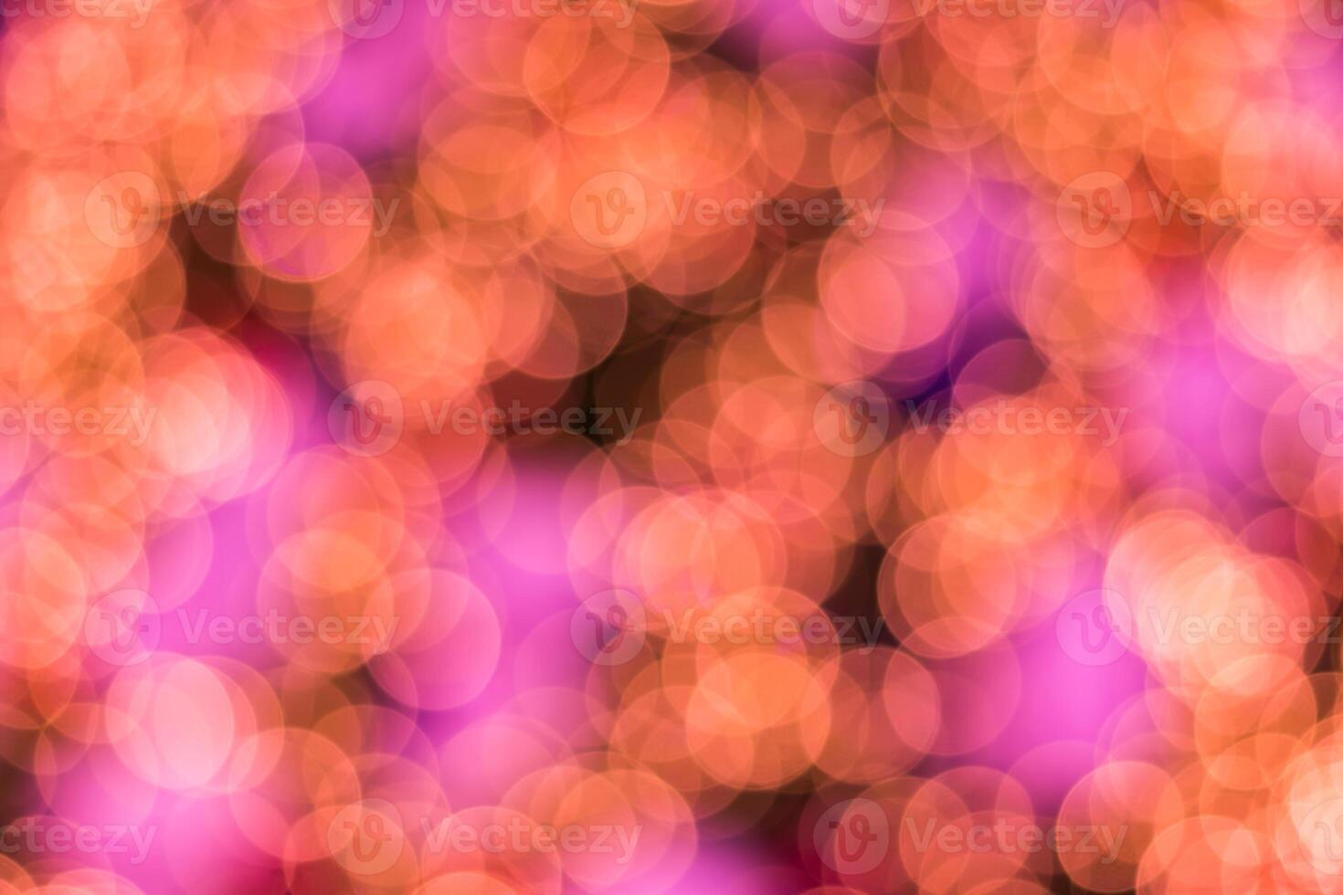 A blurry image of a pink and purple background photo