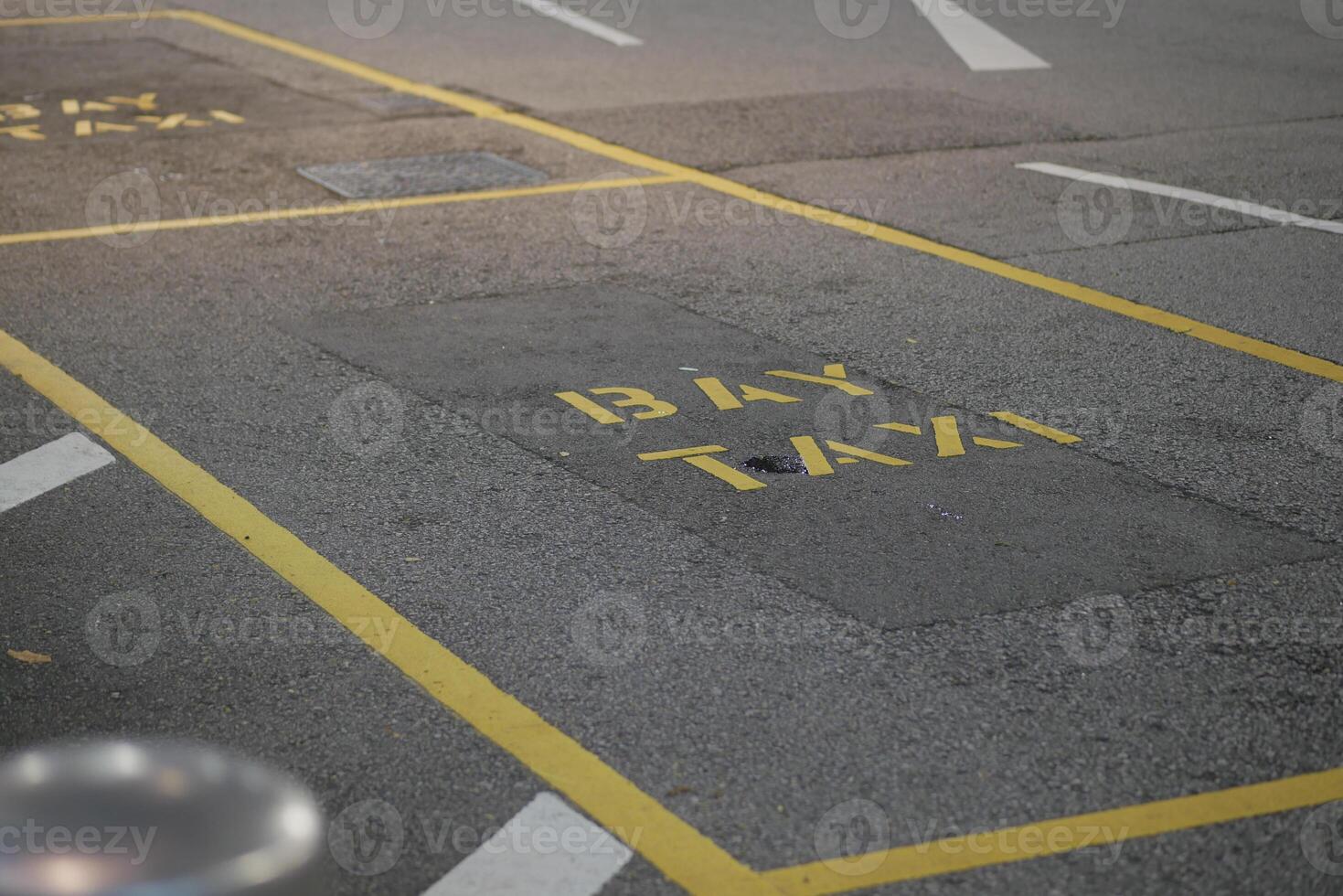 Taxi bay with visible markings in urban parking area photo