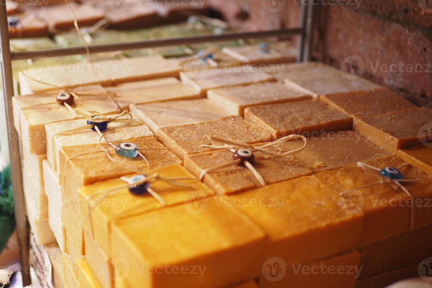 Handmade soap bars on display at local market photo
