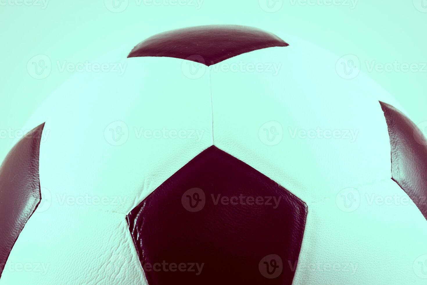 A soccer ball is shown in a close up shot photo